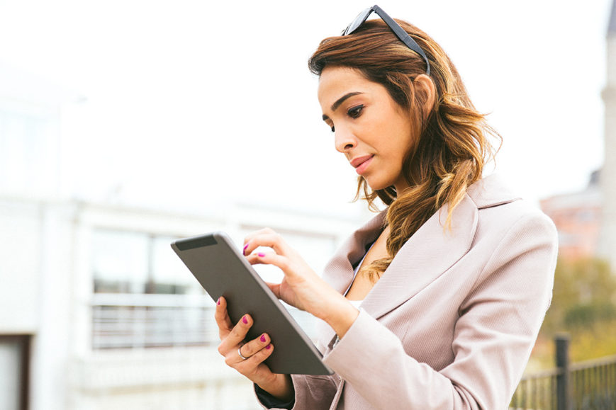 Businesswoman works on tablet