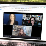 Overhead view of a webinar on a laptop screen
