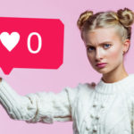 Girl holding a conversation bubble with "0 likes"
