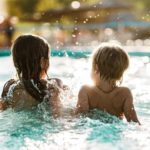 two kids at the pool