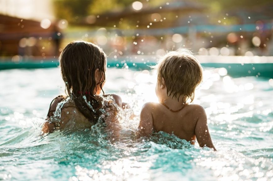two kids at the pool